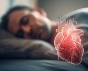 Ein schlafender Mann liegt auf einem Kissen, während ein anatomisches Herzmodell über ihm schwebt.